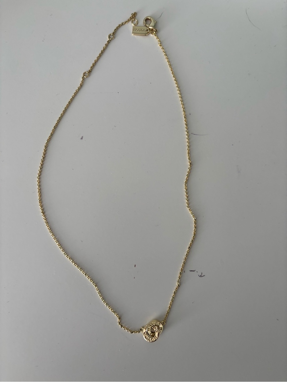 Coach outlet - Gold Toned Circle Pendant Necklace